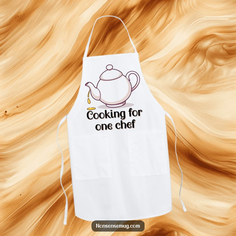 Funny teapot character featured on an apron, hilariously pouring tea into its own spout.