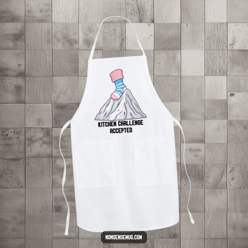 Funny Apron with a brave sock climbing Mount Laundry, ideal for kitchen tasks and spreading humorous courage.