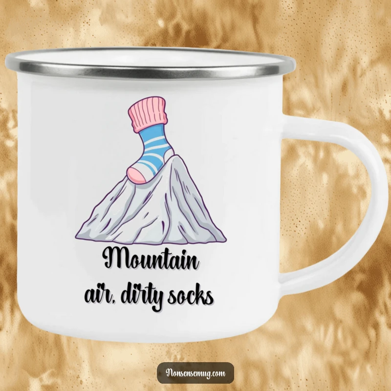 Funny Camping Mug with a brave sock climbing Mount Laundry, ideal for enjoying beverages during outdoor activities.