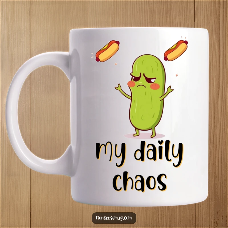 Funny grumpy pickle mug depicting a pickle looking confused while juggling three flying hot dogs with comedic intensity.