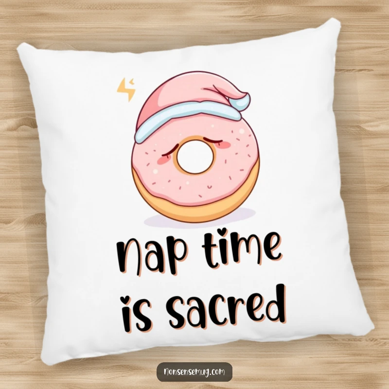 Funny sleepy donut wearing a tiny nightcap and snoring loudly, on a soft pillow, a cozy funny gift.