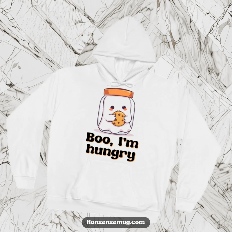 Funny playful ghost, sneaking a cookie from a jar, depicted on a warm hoodie, offering comfort and a touch of spectral mischief.