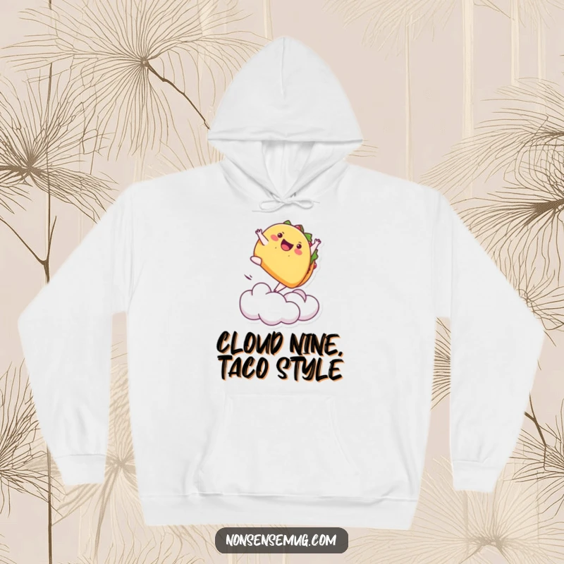 Funny hoodie with a playful taco doing a backflip off a cloud, combining warmth with energetic humor.