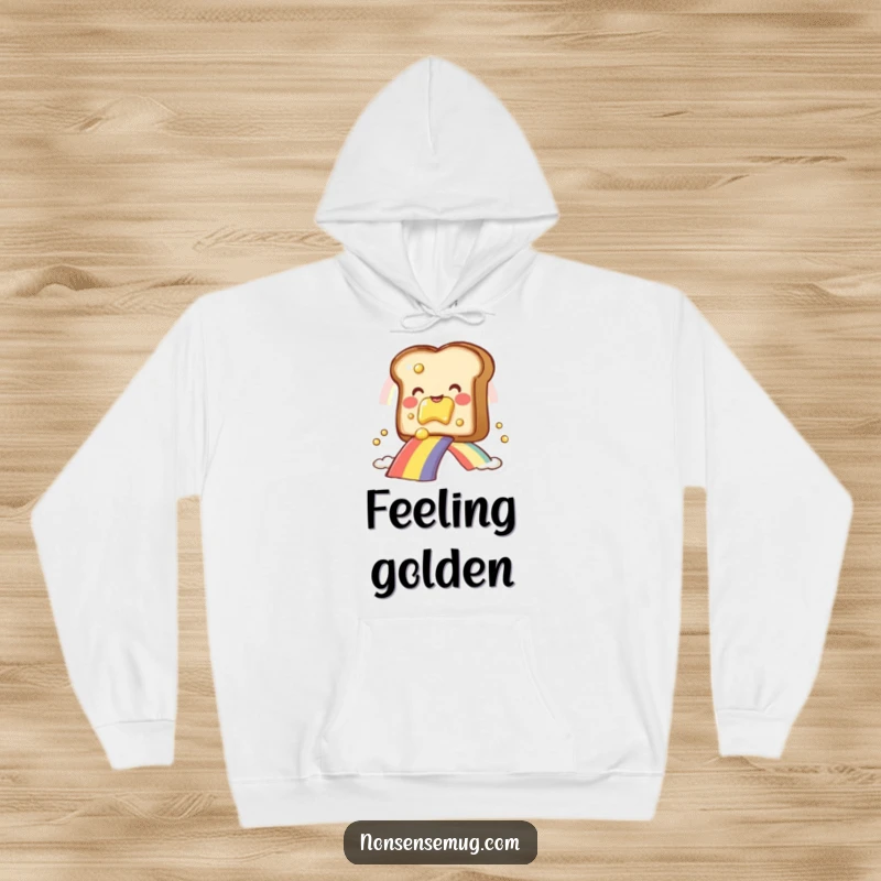 Funny toast character with butter, gliding down a colorful rainbow, on a soft hoodie, excellent funny gift.