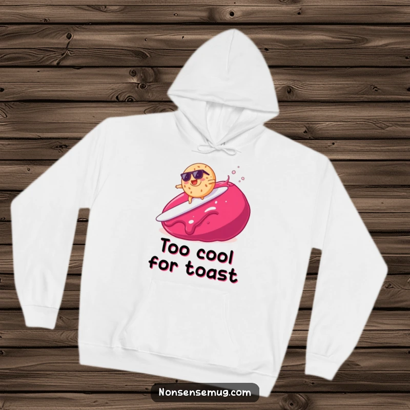 Cozy funny hoodie featuring a bagel in sunglasses surfing a big blob of jam, great for casual wear.