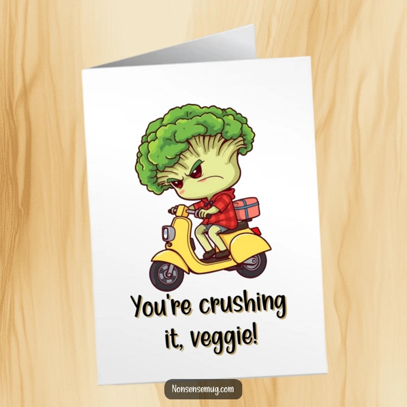 Funny Free Printable Congratulations Card: A grumpy broccoli head rides backwards on a small scooter, embracing the absurd.