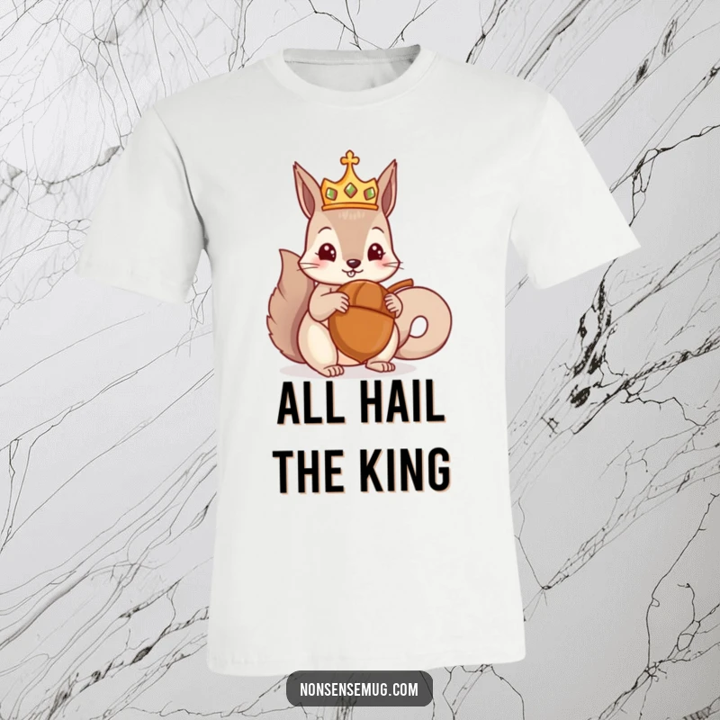 Funny t-shirt depicting a crowned squirrel receiving a massive acorn, a symbol of ultimate victory and nutty ambition, perfect for a funny gift.