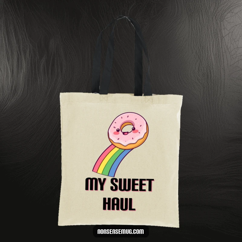 Funny tote bag showcasing a happy donut sliding down a vibrant rainbow, perfect for carrying essentials with flair.