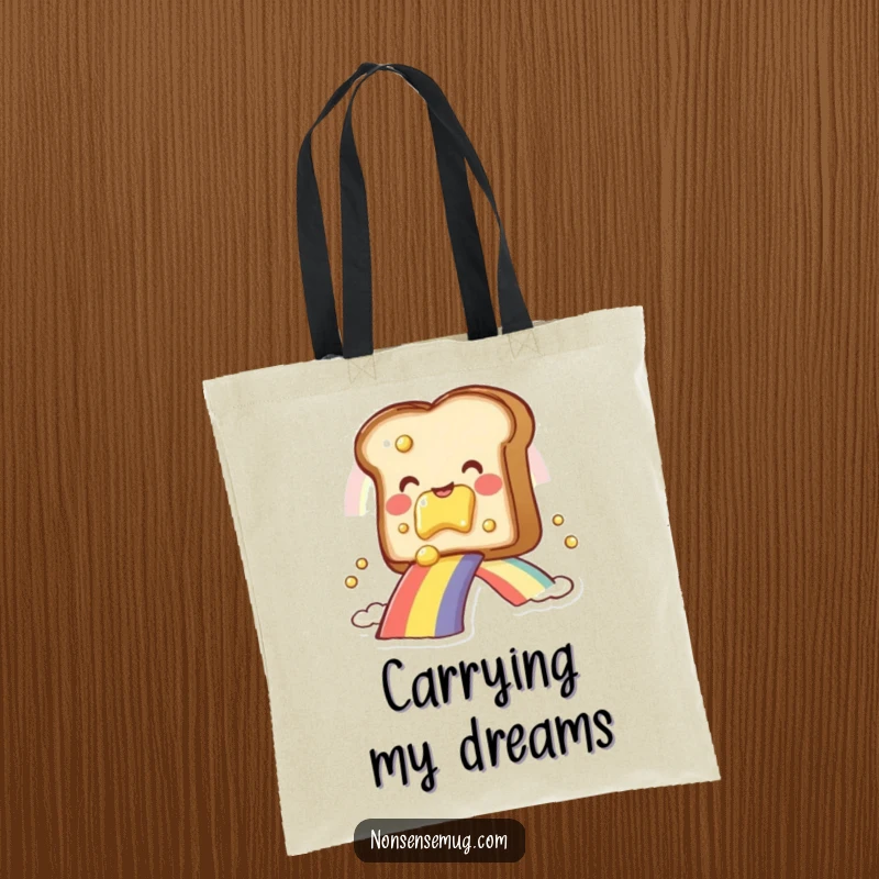 Funny toast with butter, sliding down a rainbow, on a spacious tote bag, a delightful funny gift.