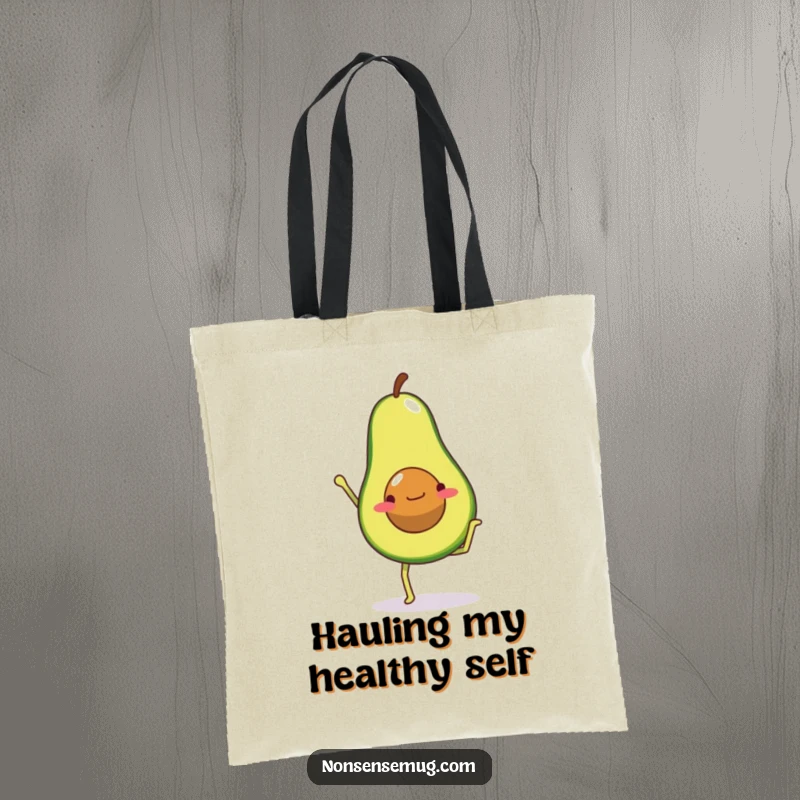Funny tote bag design of an avocado with legs in a wobbly handstand pose, promoting health and humor.